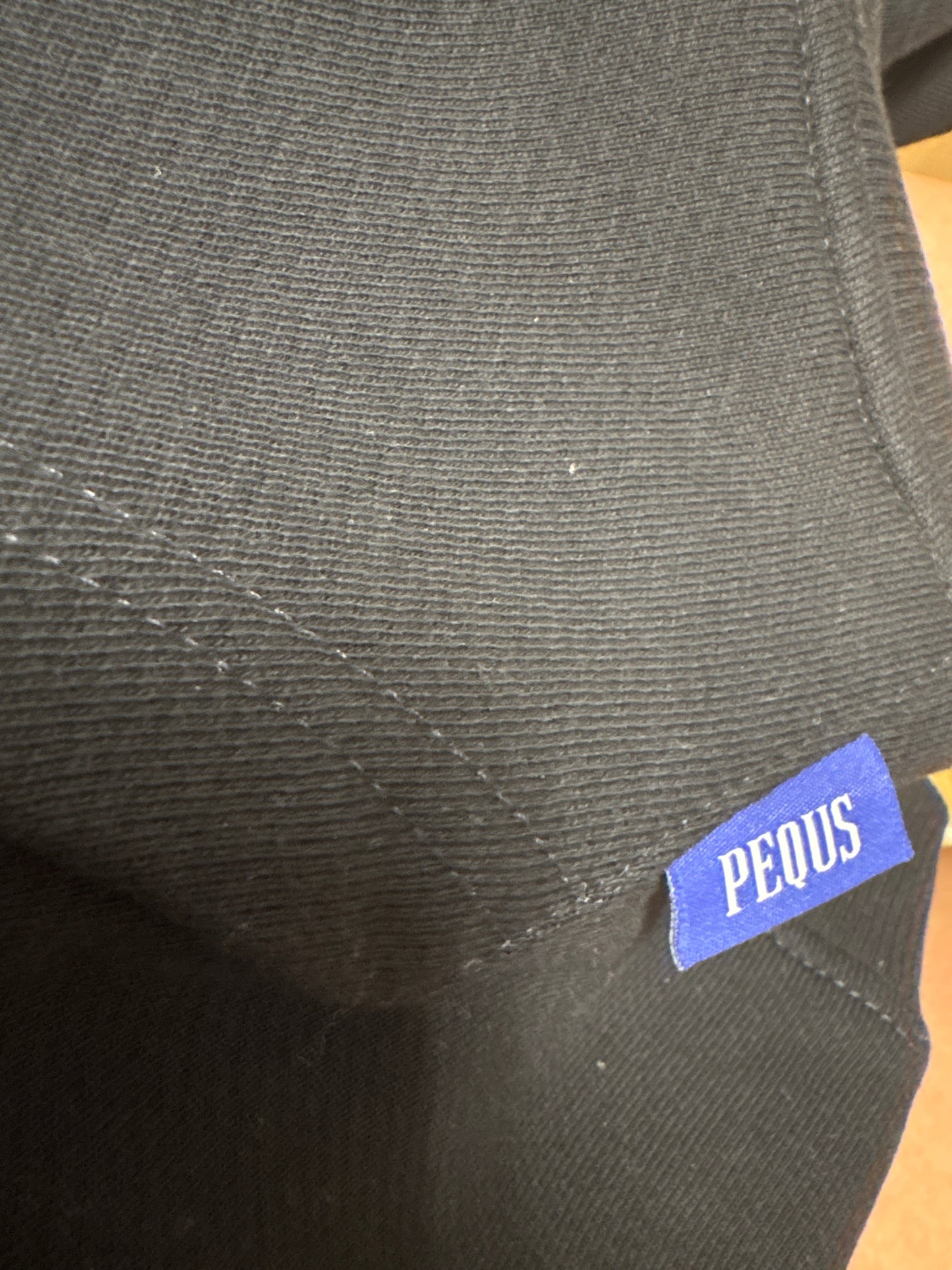 Pequs Hoodie in schwarz mit Backprint, Größe L