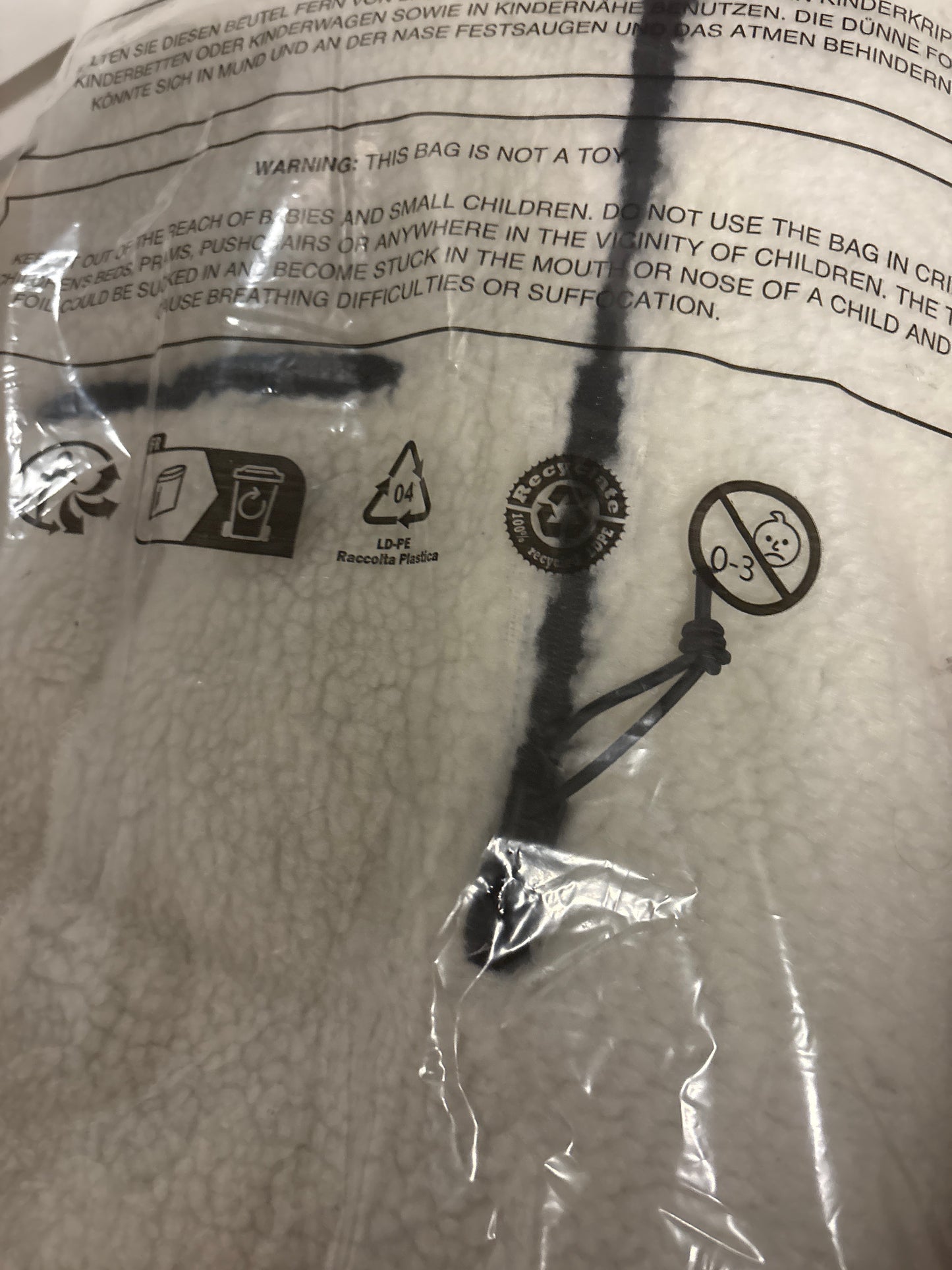 Brandit Zipper, Größe M in weiss/plüsch