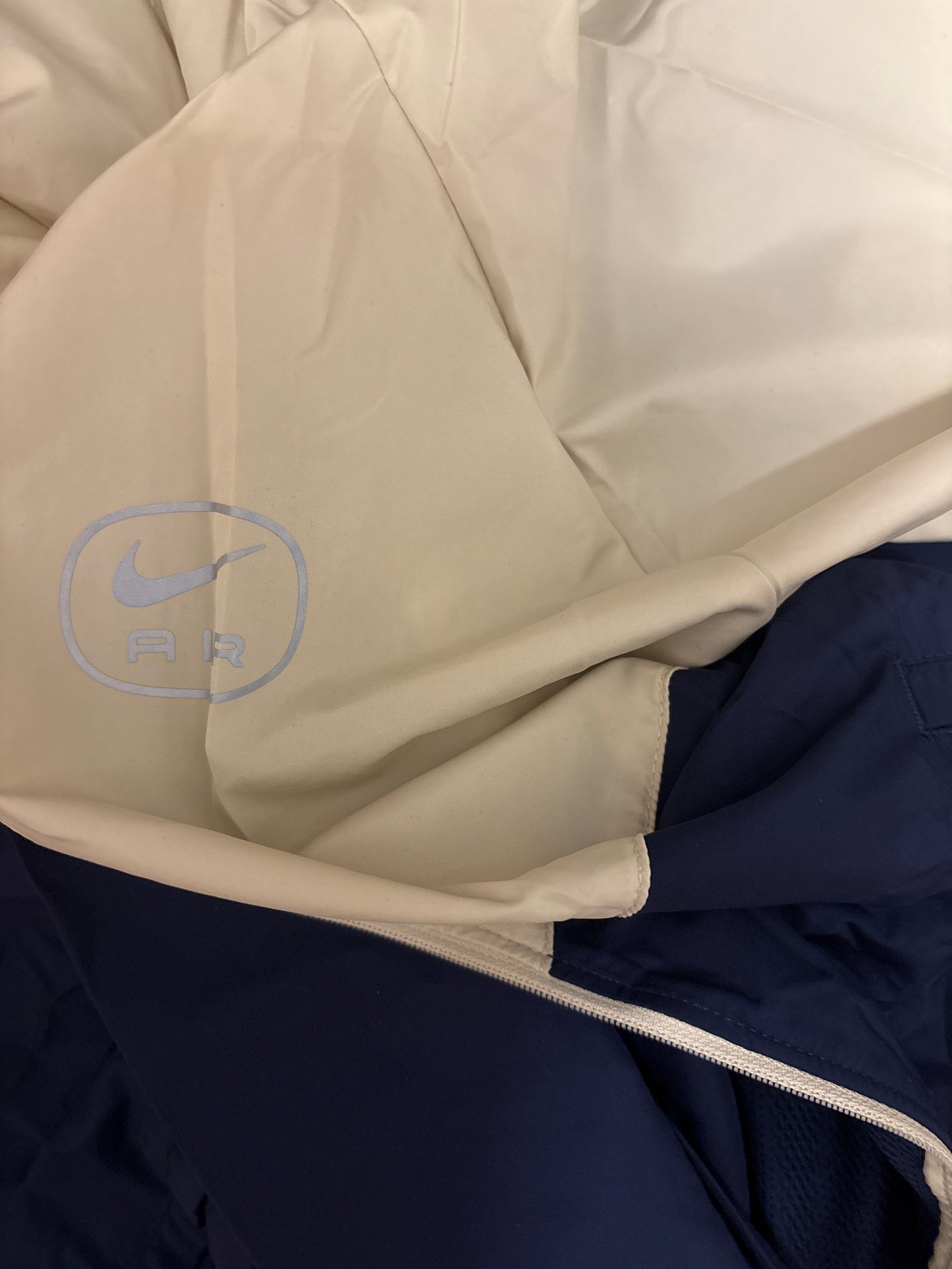 Nike Regenjacke in creme/dunkelblau Größe wählbar