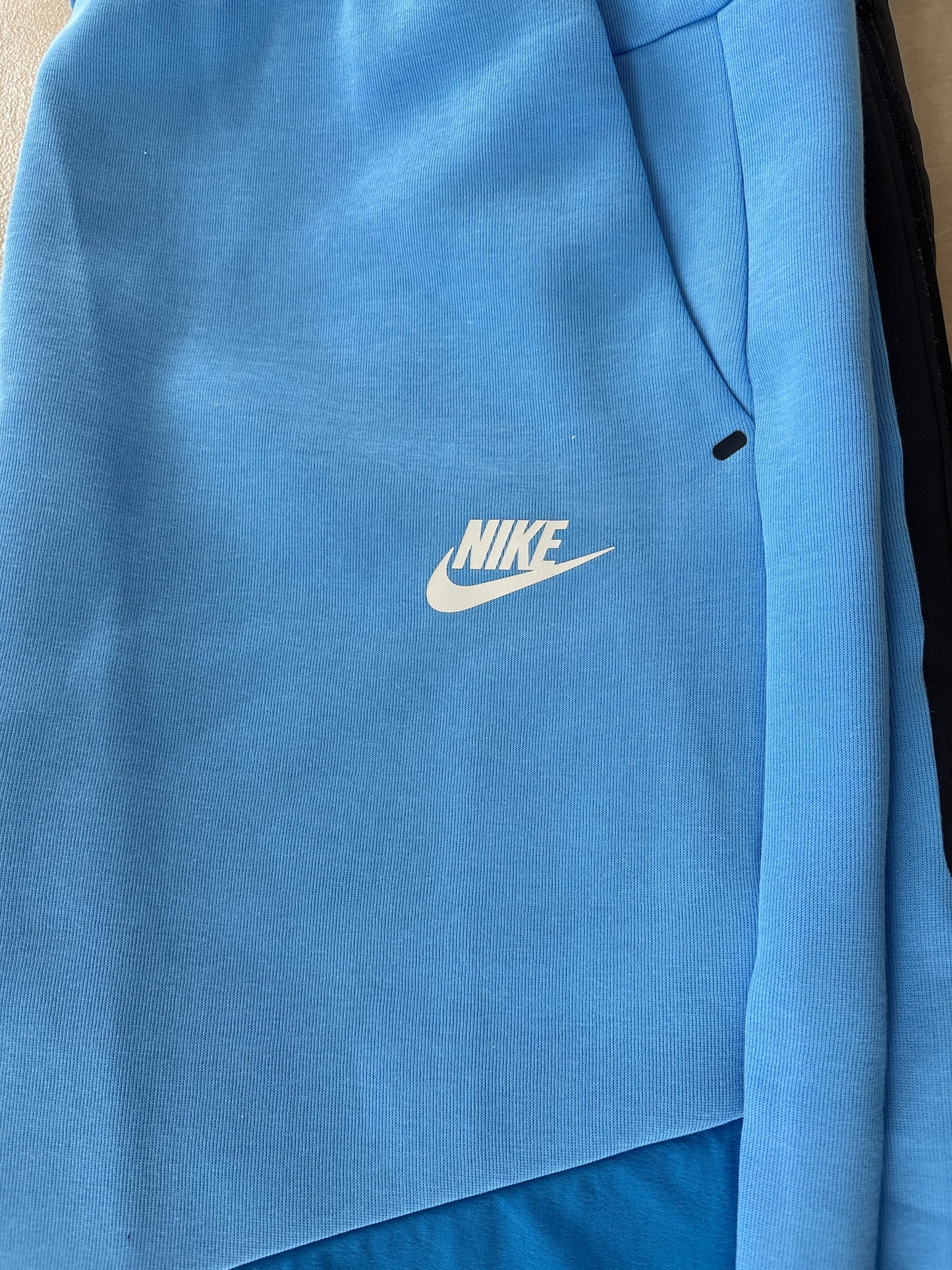Nike Techhose in blau, Größe wählbar