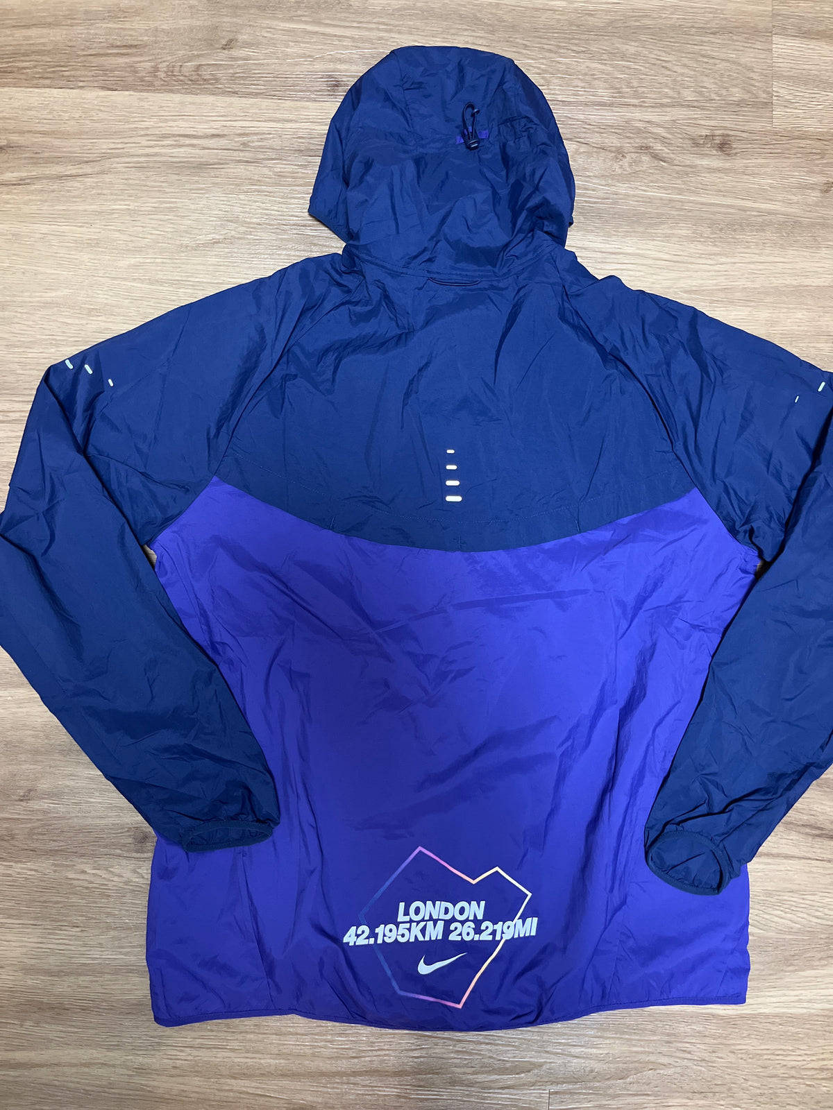 Nike Laufjacke in dunkel/lila, Größe wählbar