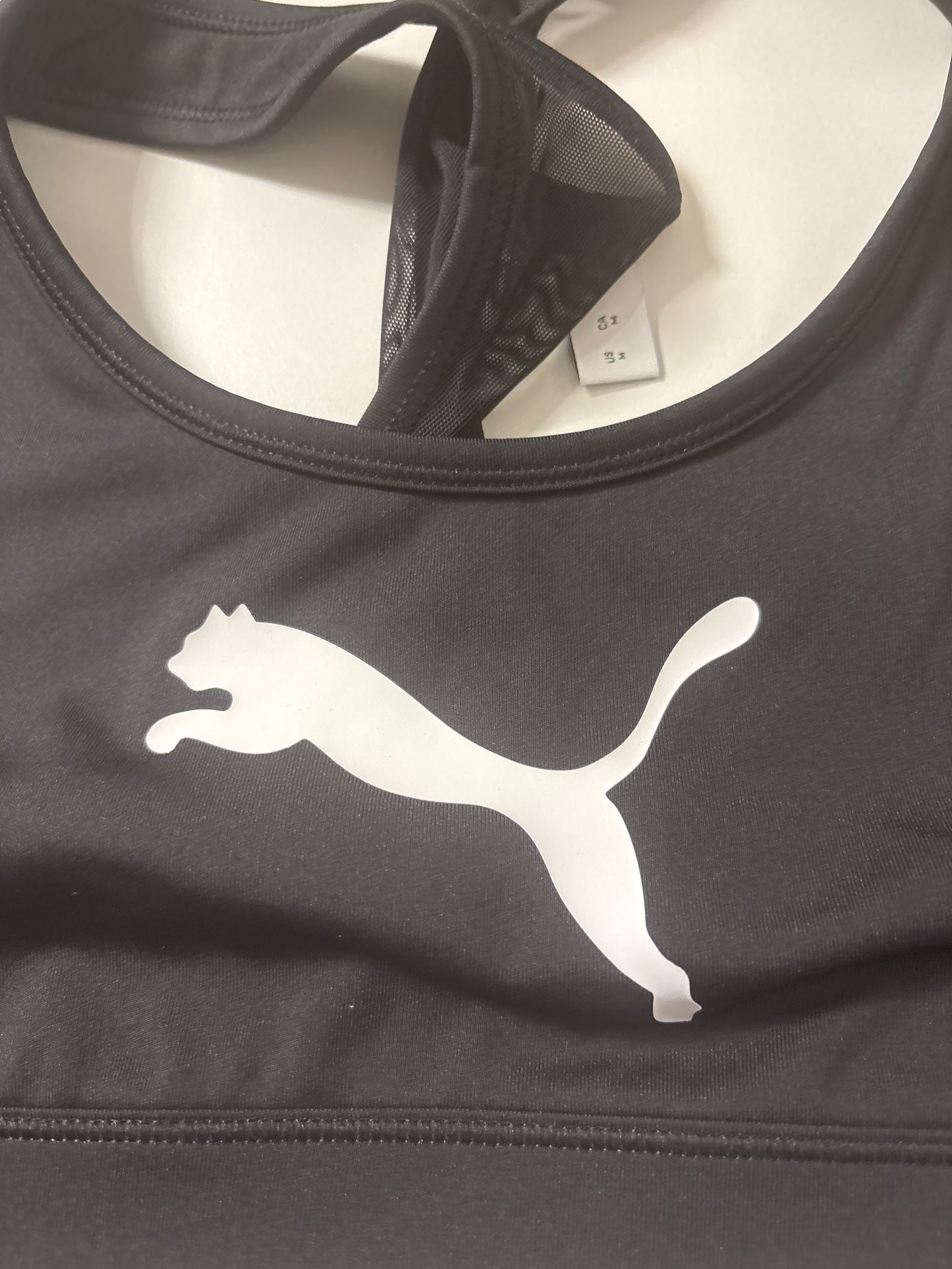 Puma Sport BH in schwarz/schwarz, Größe wählbar