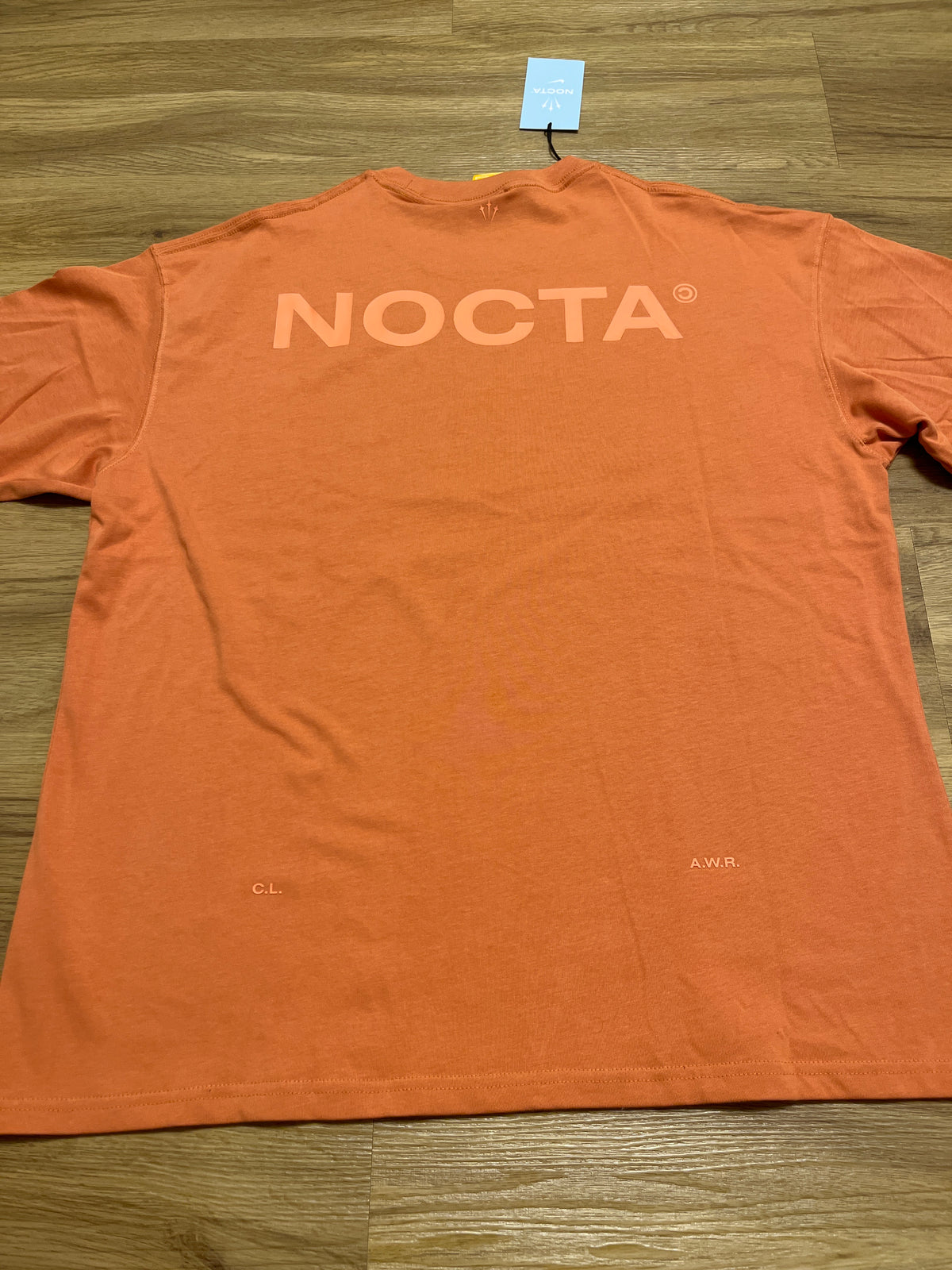 Nike Nocta Tshirt in orange, Größe M