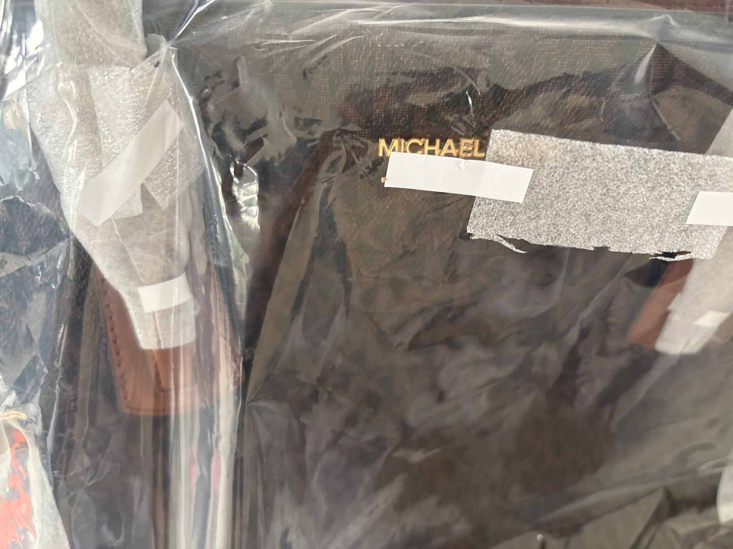 Michael Kors Voyager braun