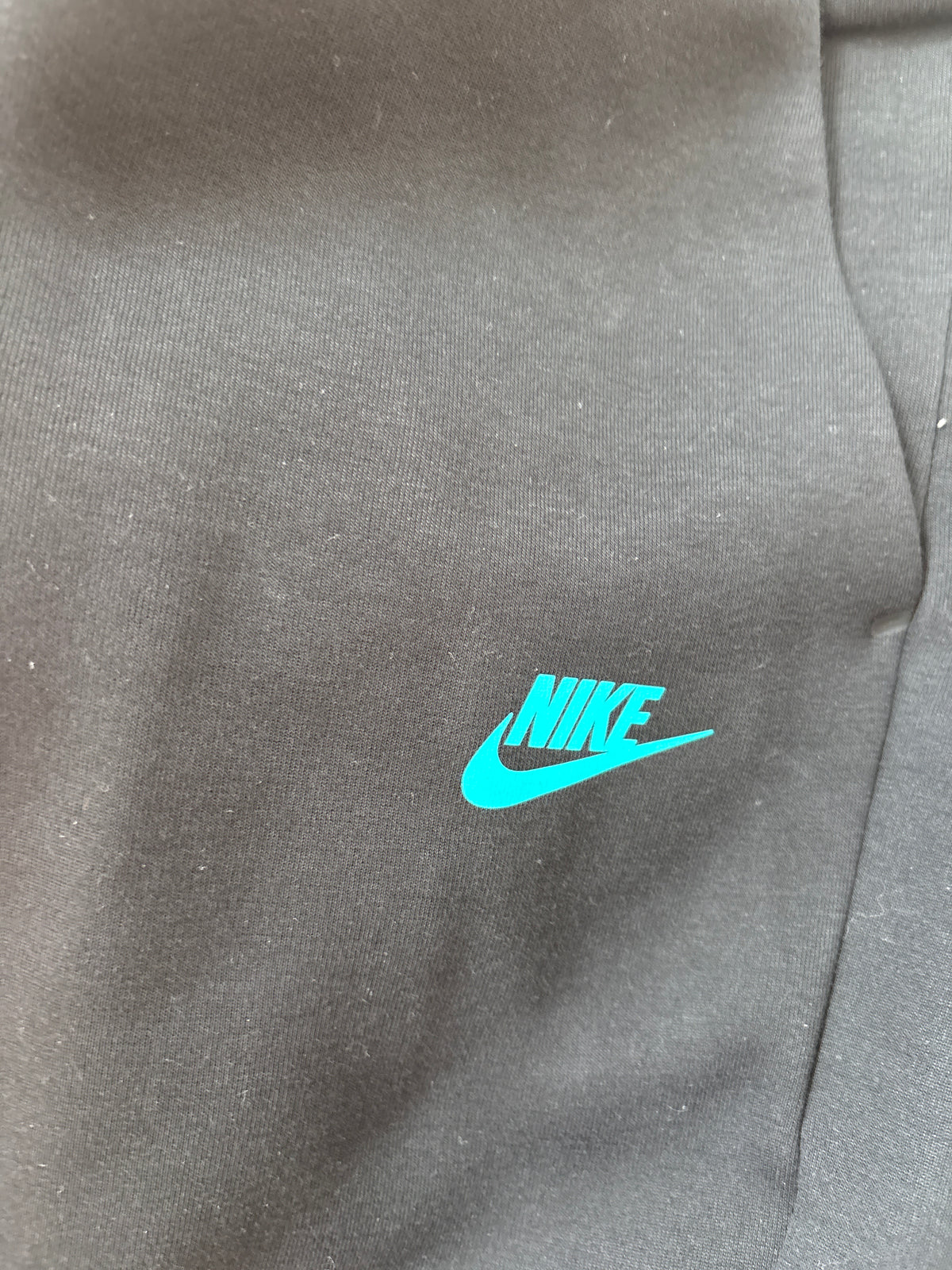 Nike Techhose in schwarz/türkis , Größe XL