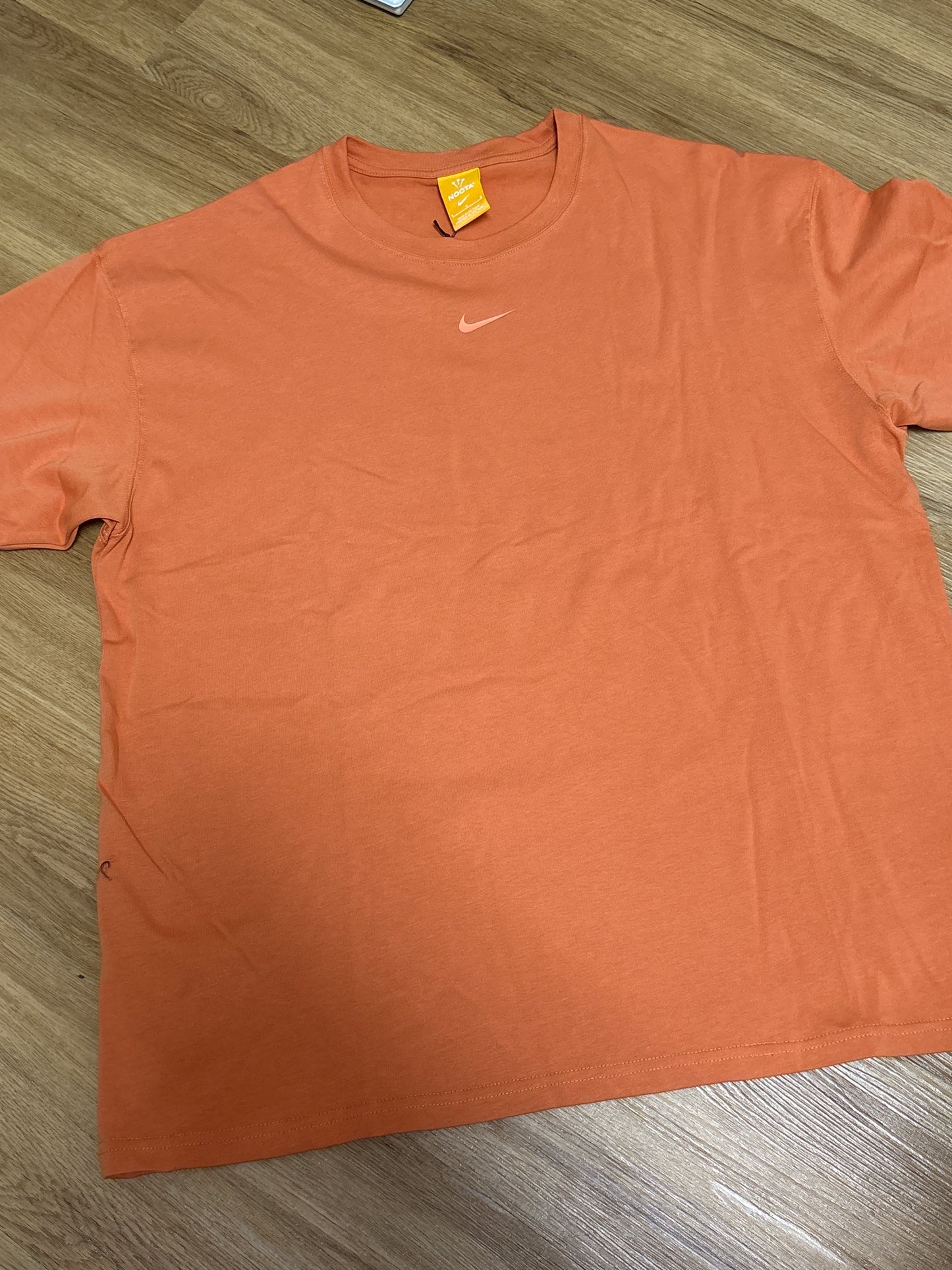 Nike Nocta Tshirt in orange, Größe L