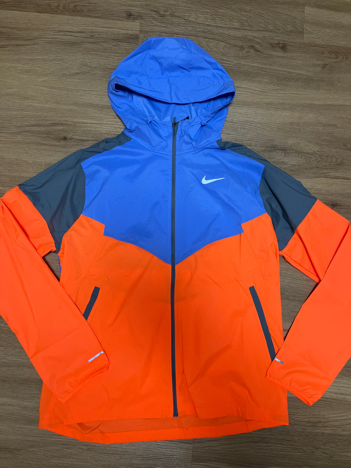 Nike Laufjacke in orange/blau/grau, Größe wählbar