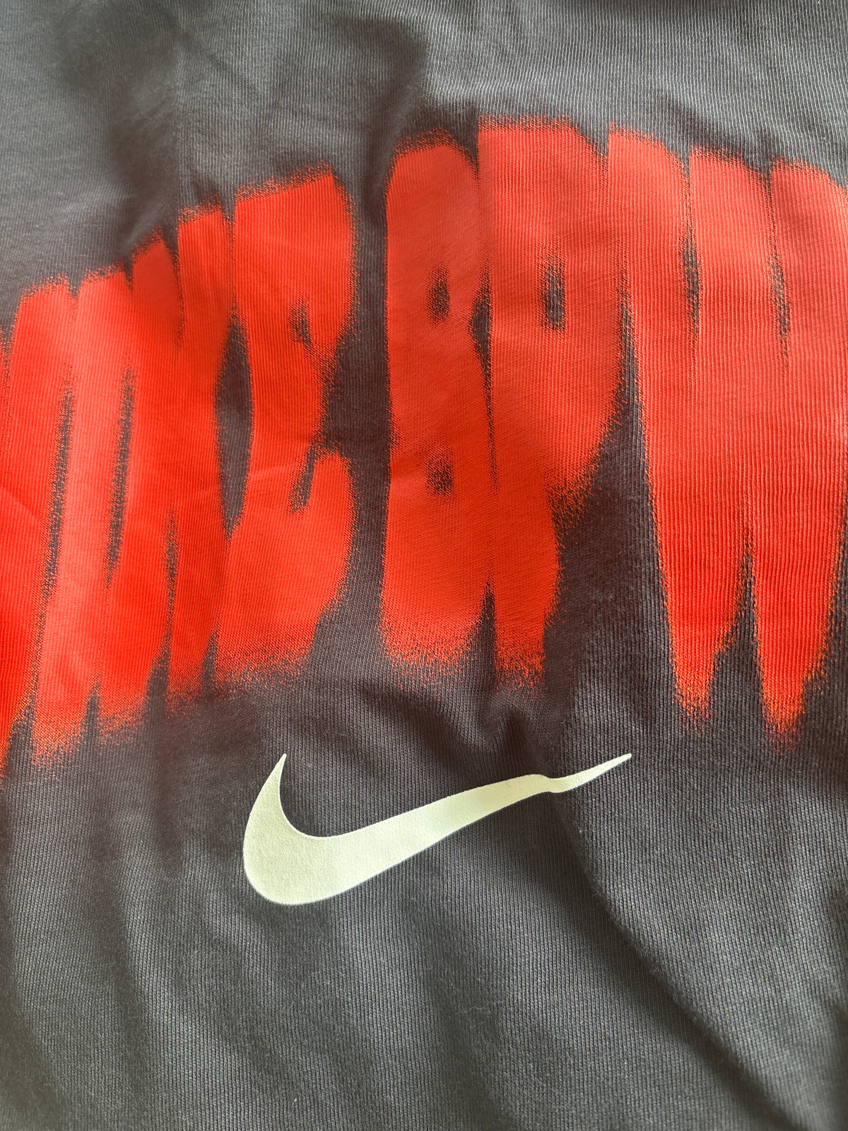 Nike Tshirt in schwarz/backprint, Größe M