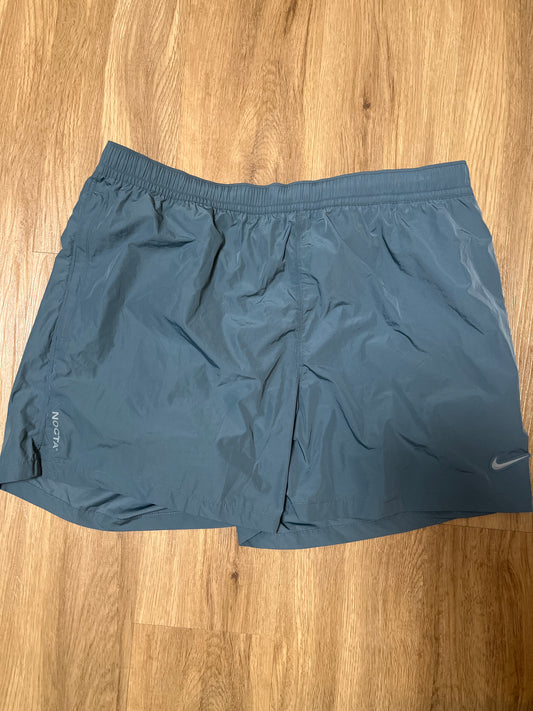 Nike Nocta kurze Hose in grünton, Größe XXL