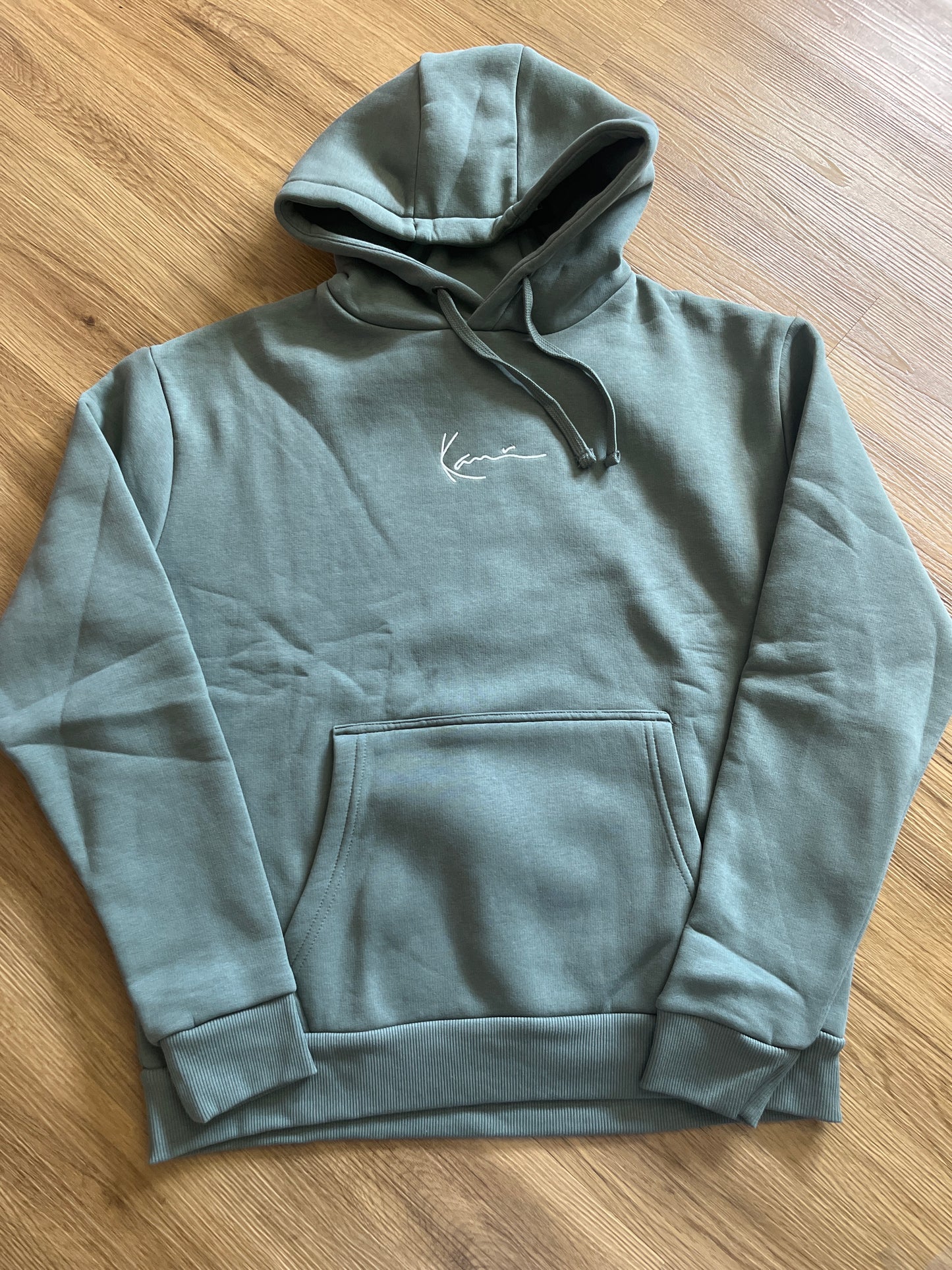 Karl Kani Hoodie in pastellgrün mit Schnüren, Größe M