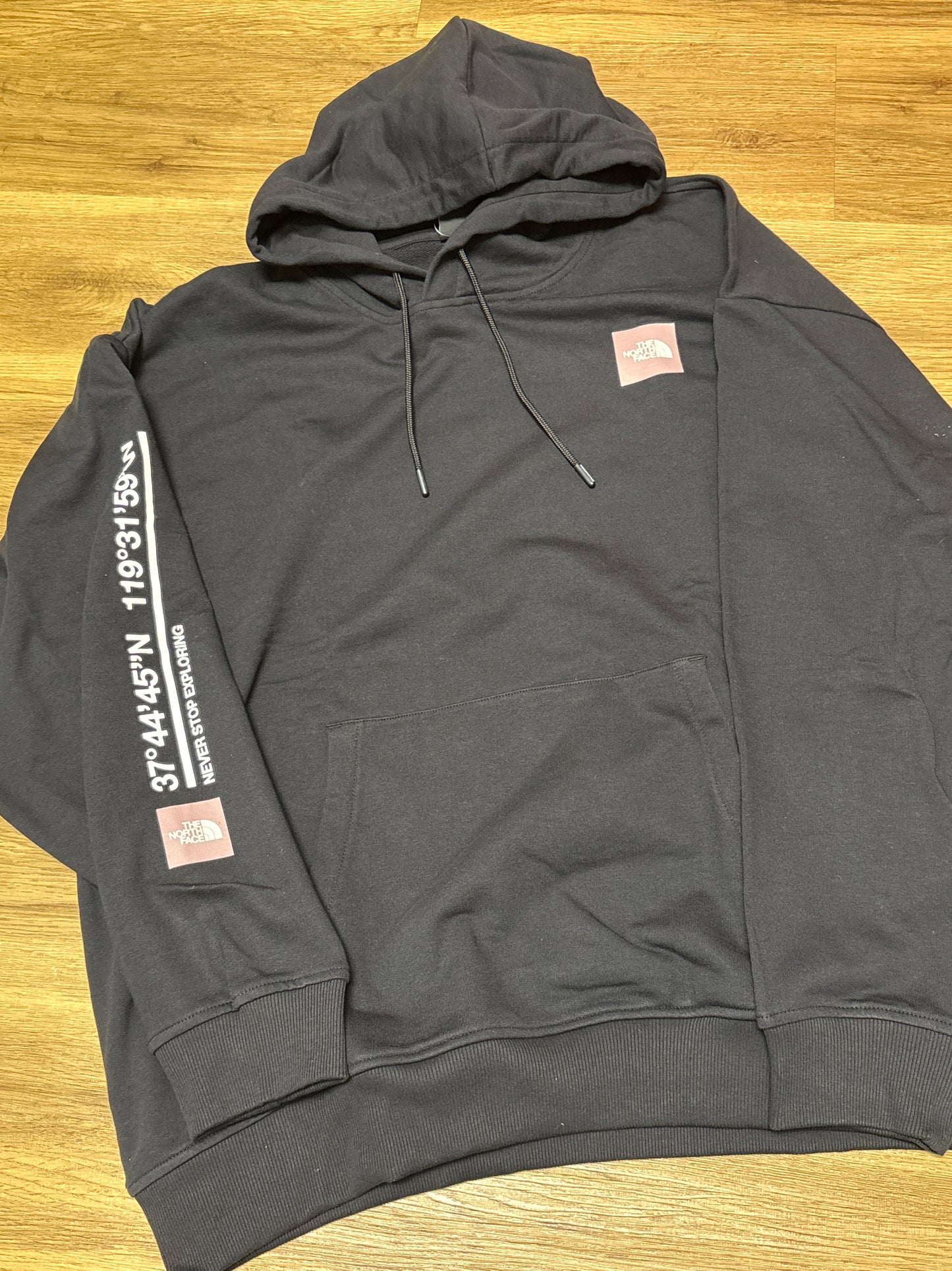 The North Face Damen Hoodie in schwarz mit Backprint, Größe XL