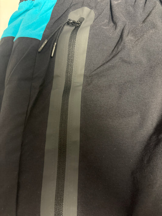 Nike Techhose kurz in Türkis/schwarz, Größe L