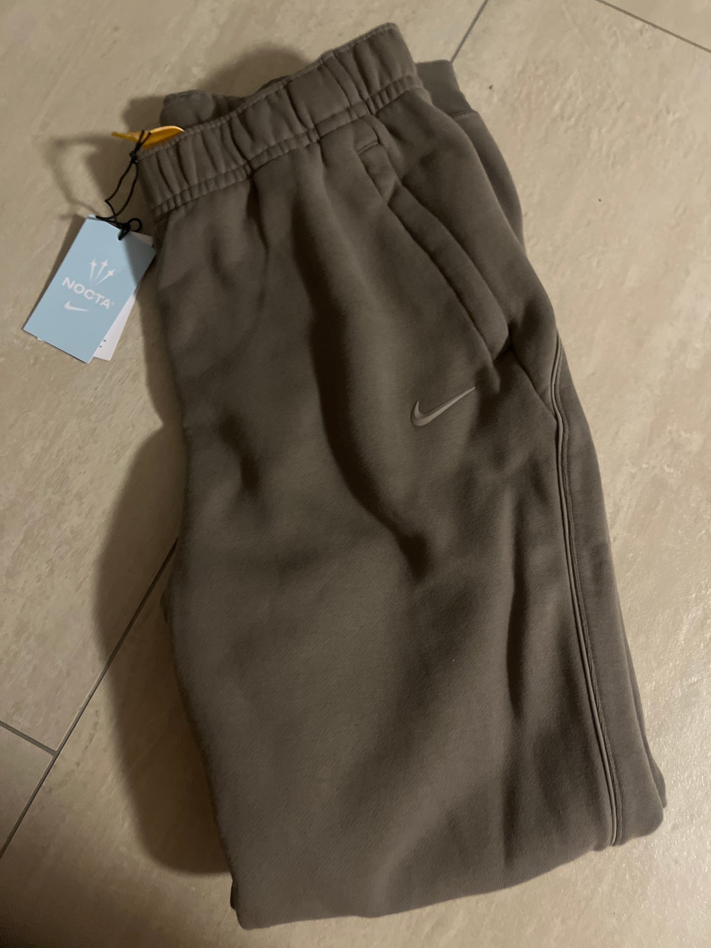 Nike Nocta Jogginghose in braun , Größe M