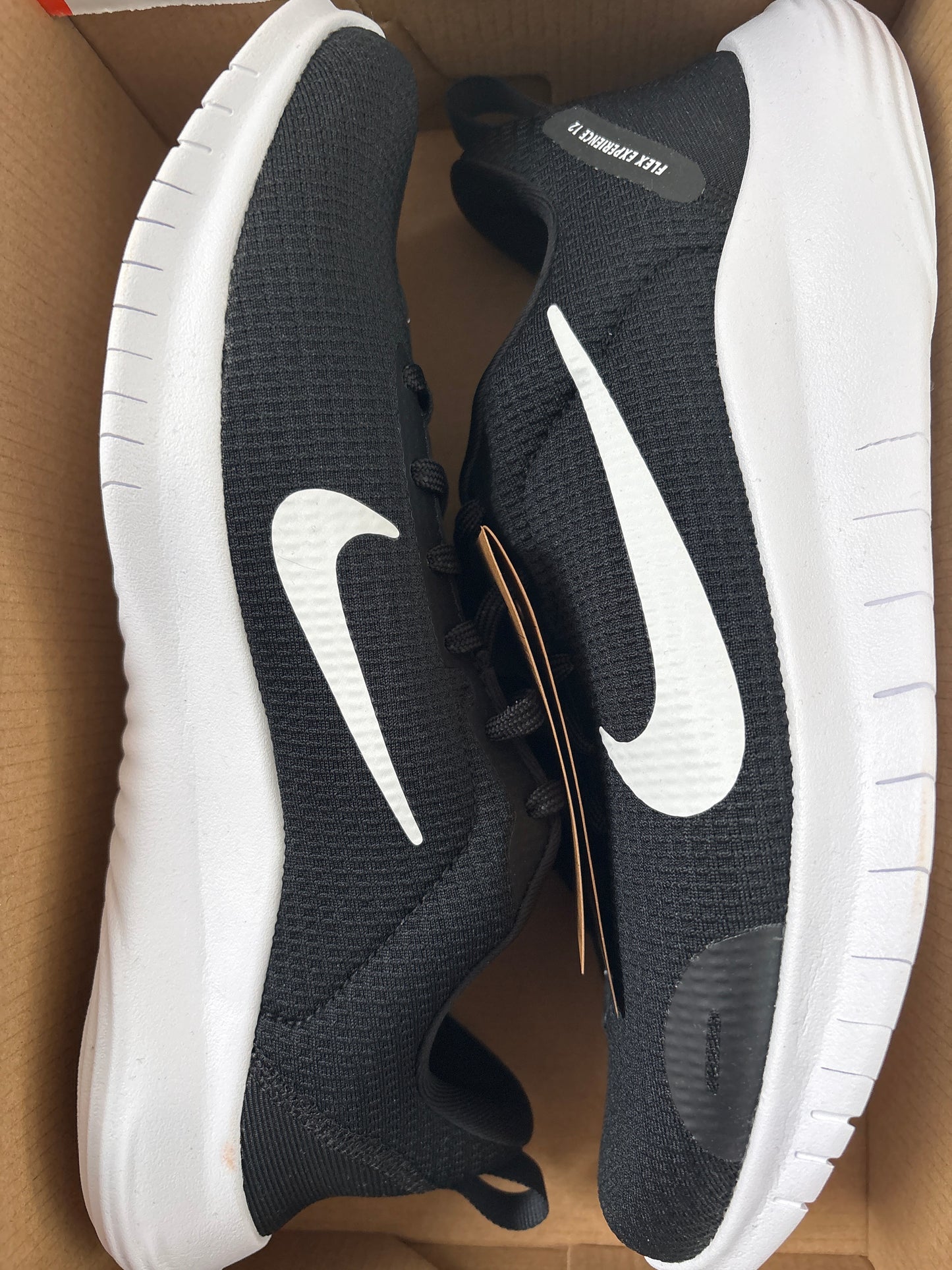 Nike Flex Experience RN 12 in weiss/schwarz, Gr. 42