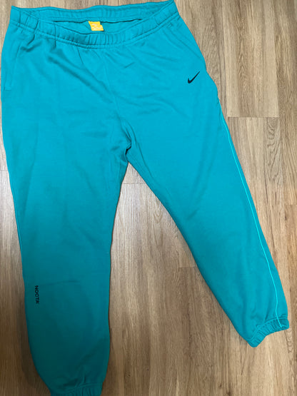 Nike Nocta Jogginghose in grün , Größe wählbar
