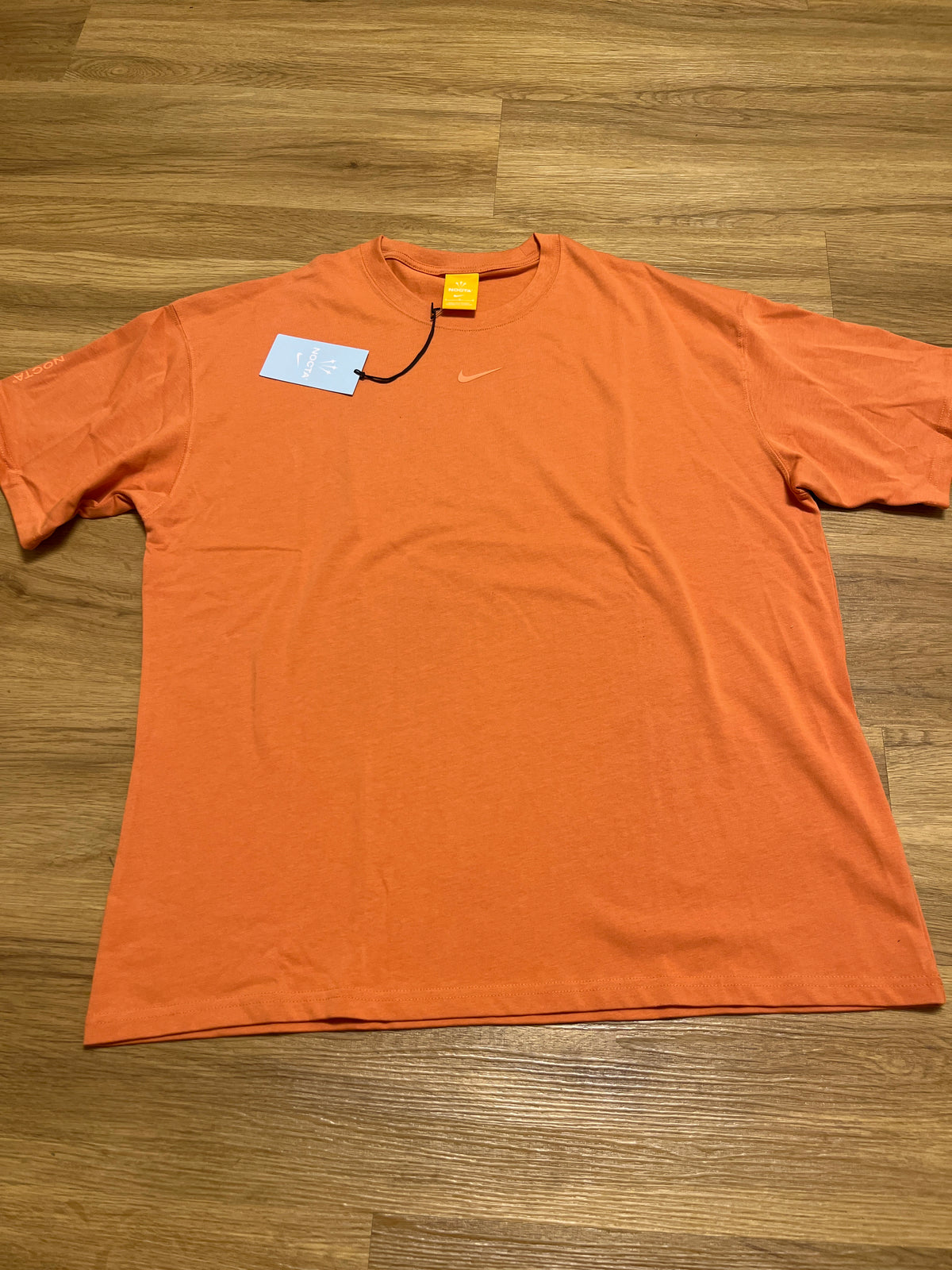 Nike Nocta Tshirt in orange, Größe M