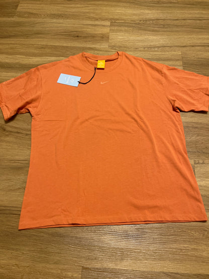 Nike Nocta Tshirt in orange, Größe M