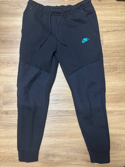 Nike Techfit Jogginghose in schwarz/türkis, Größe L