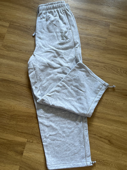 Karl Kani Jogginghose in grau mit verstellbarem Saum, Größe L
