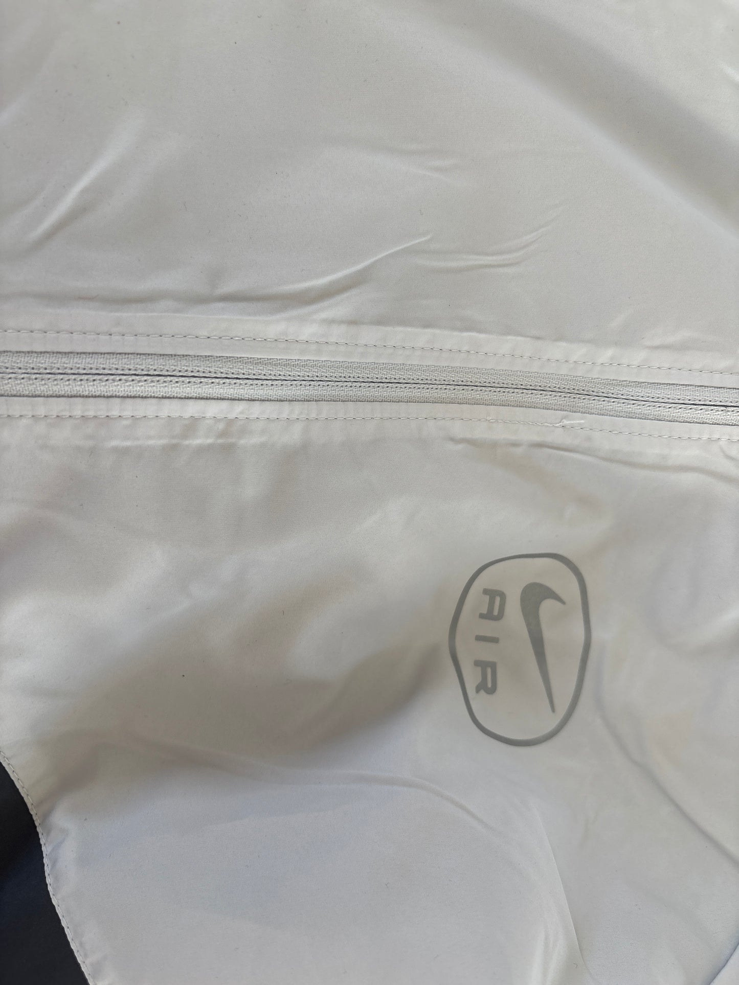 Nike Laufjacke/Windbreaker in grau/türkis Größe S