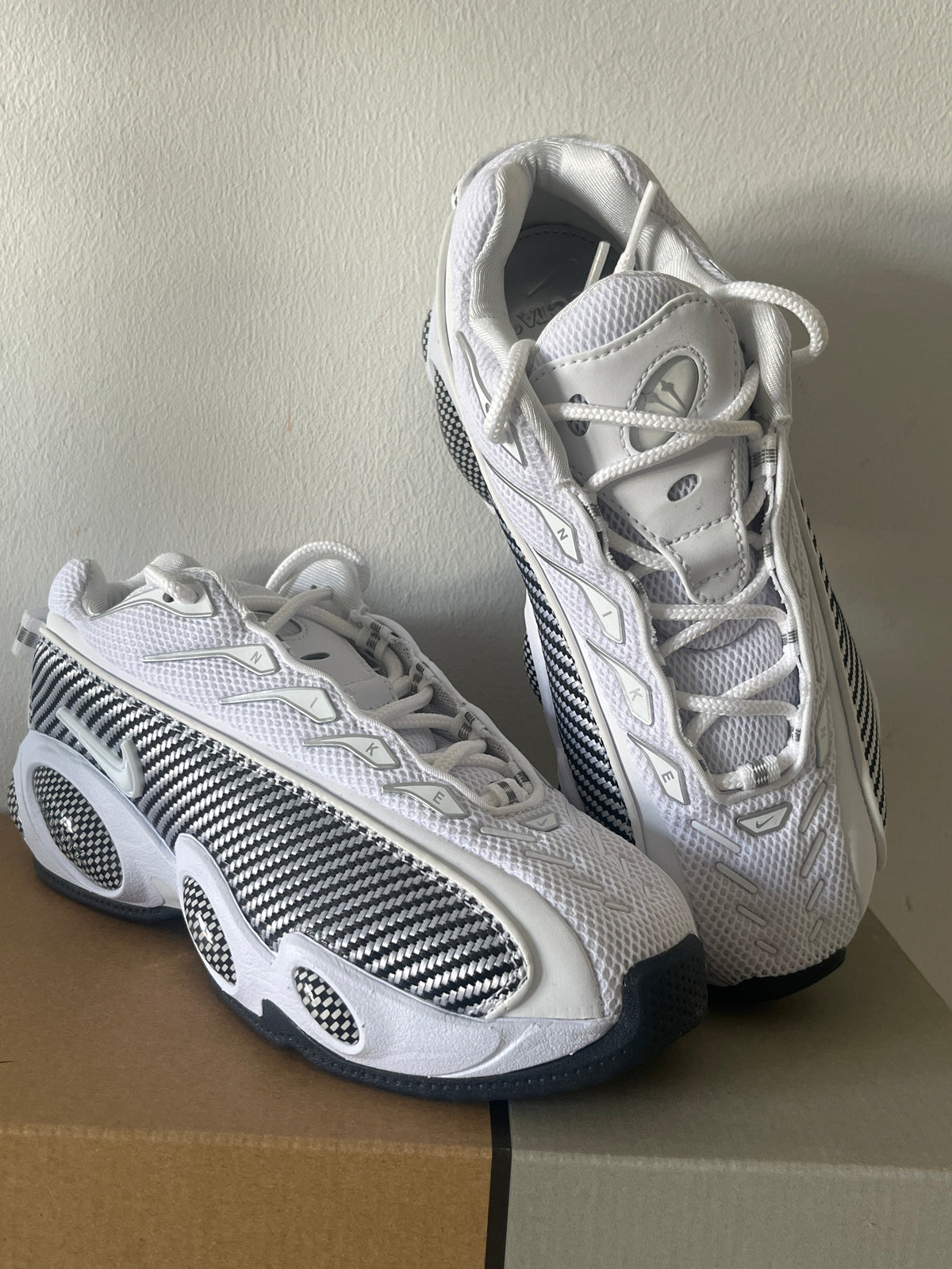 Nike Nocta Glide in weiß/schwarz/silber, Größe 37,5