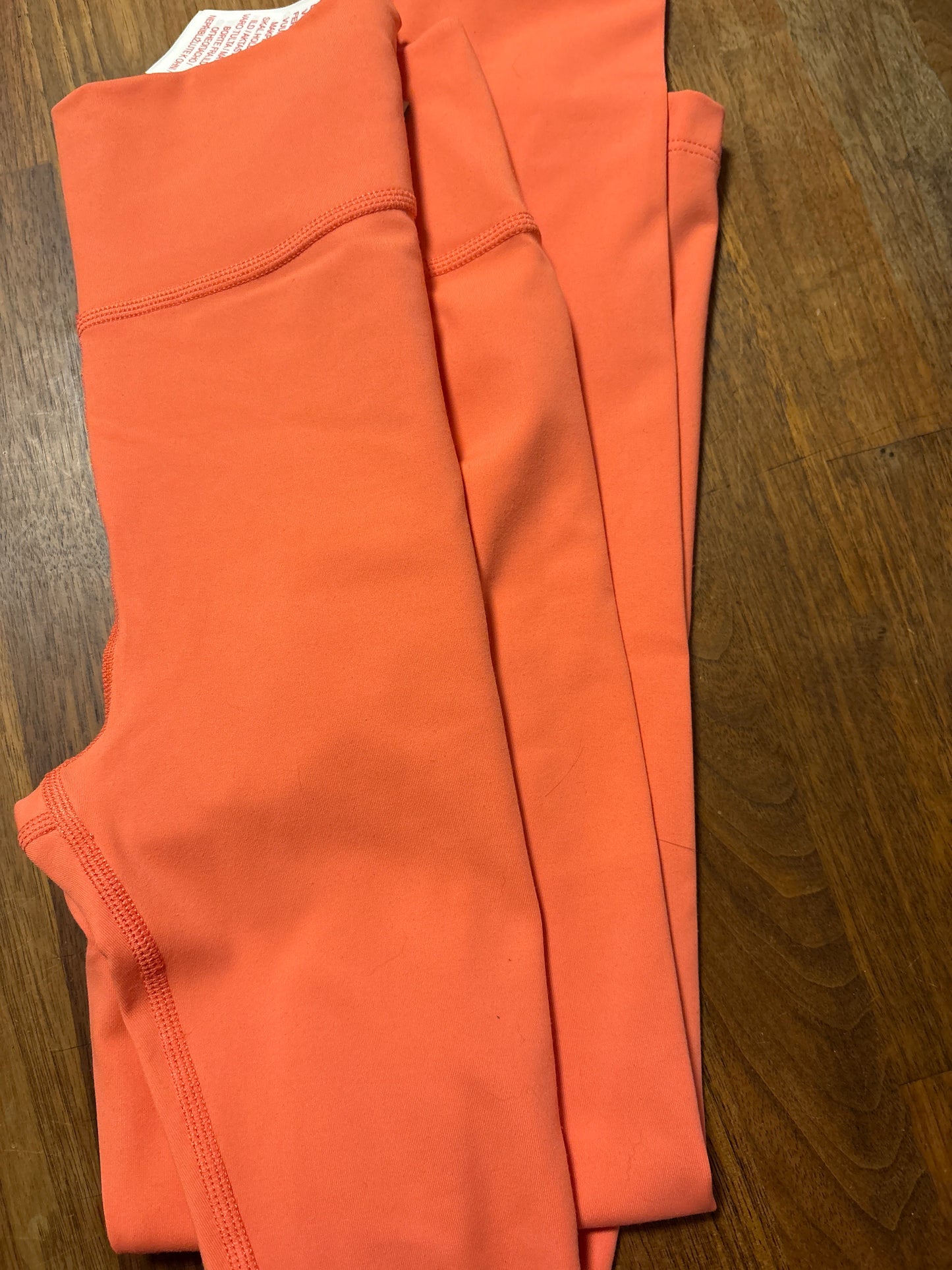 Nike Kinder Leggins in orange, Größe M