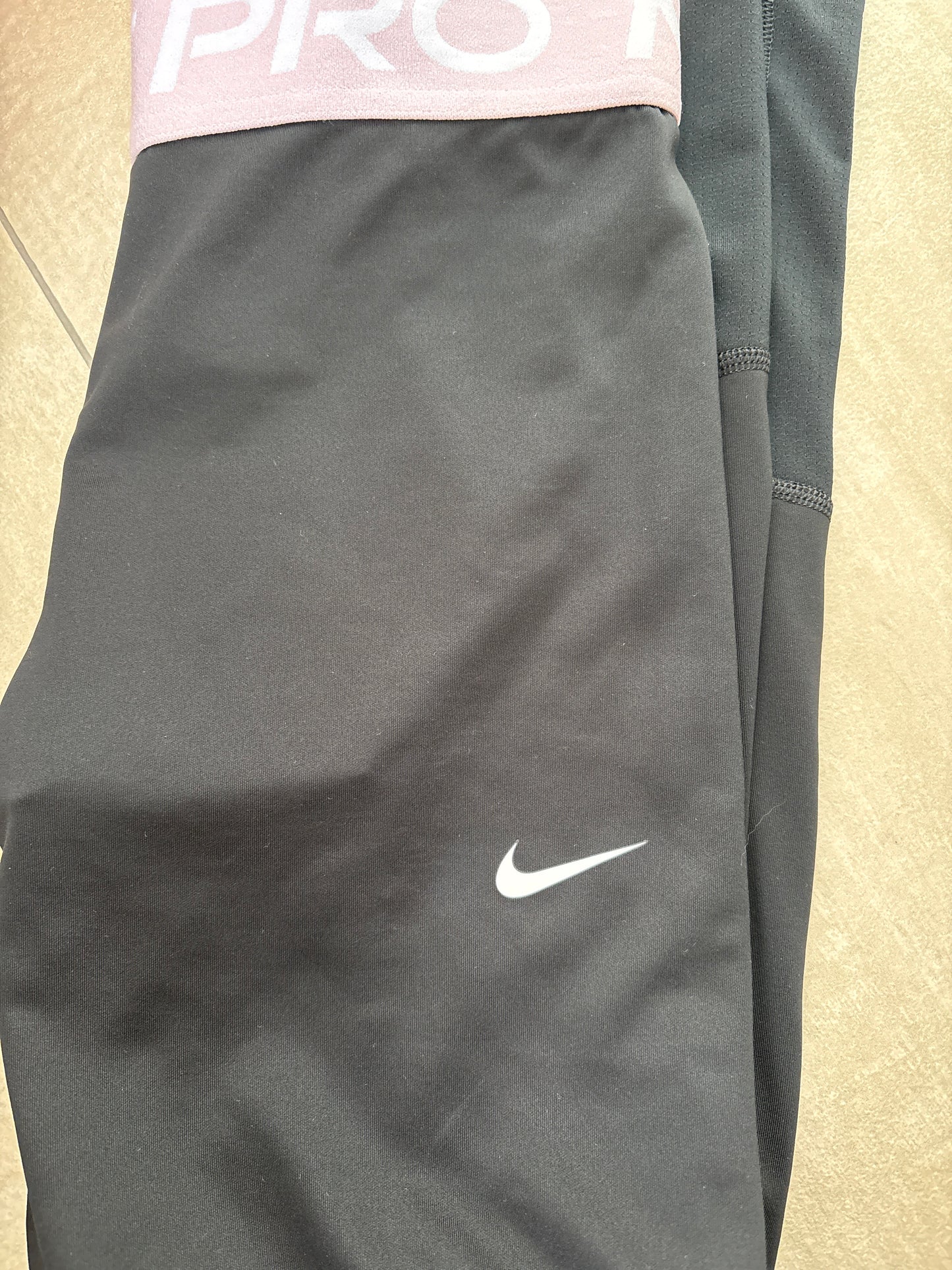 Nike Kinder Leggins in schwarz/weiss/rosa , Größe M