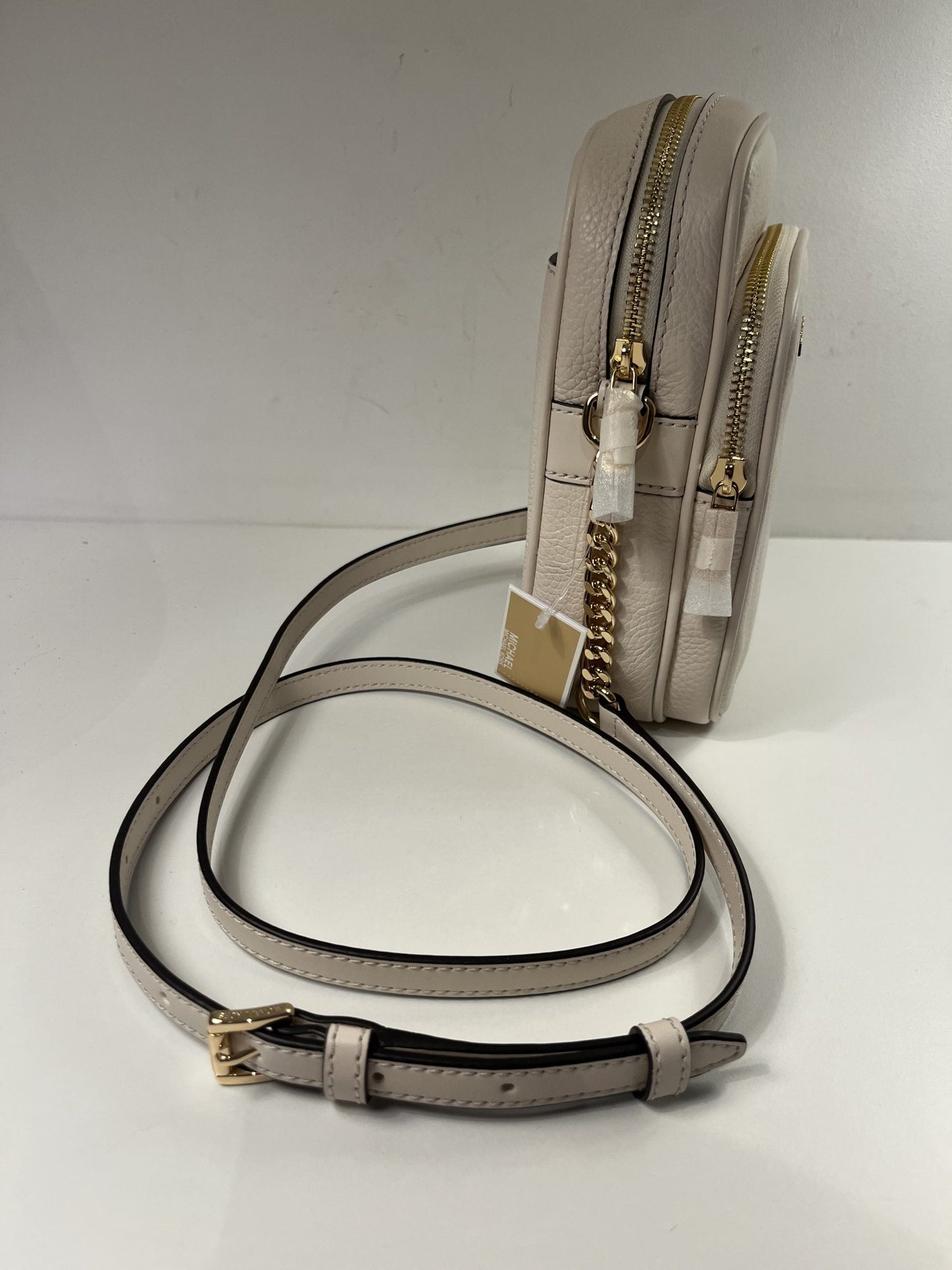 Michael Kors Handtasche Jet Set Travel in creme mit gekrispeltem Leder